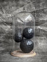 Glass dome on a wooden base