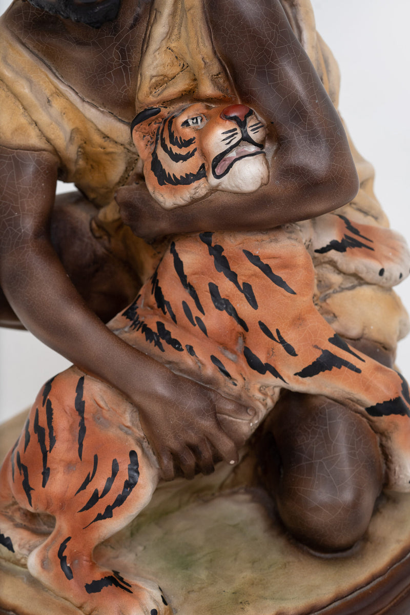 Vintage Collection; Sculpture of a Man Holding Tiger